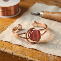 Bracciale in Rame con Pietra Rosa Centrale