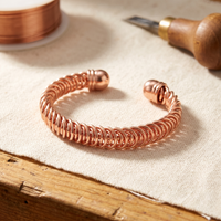 Bracciale in Rame ad Anelli Avvolti