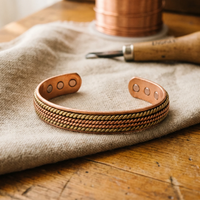 Parure in Rame: Bracciale a Losanghe e Bracciale Floreale